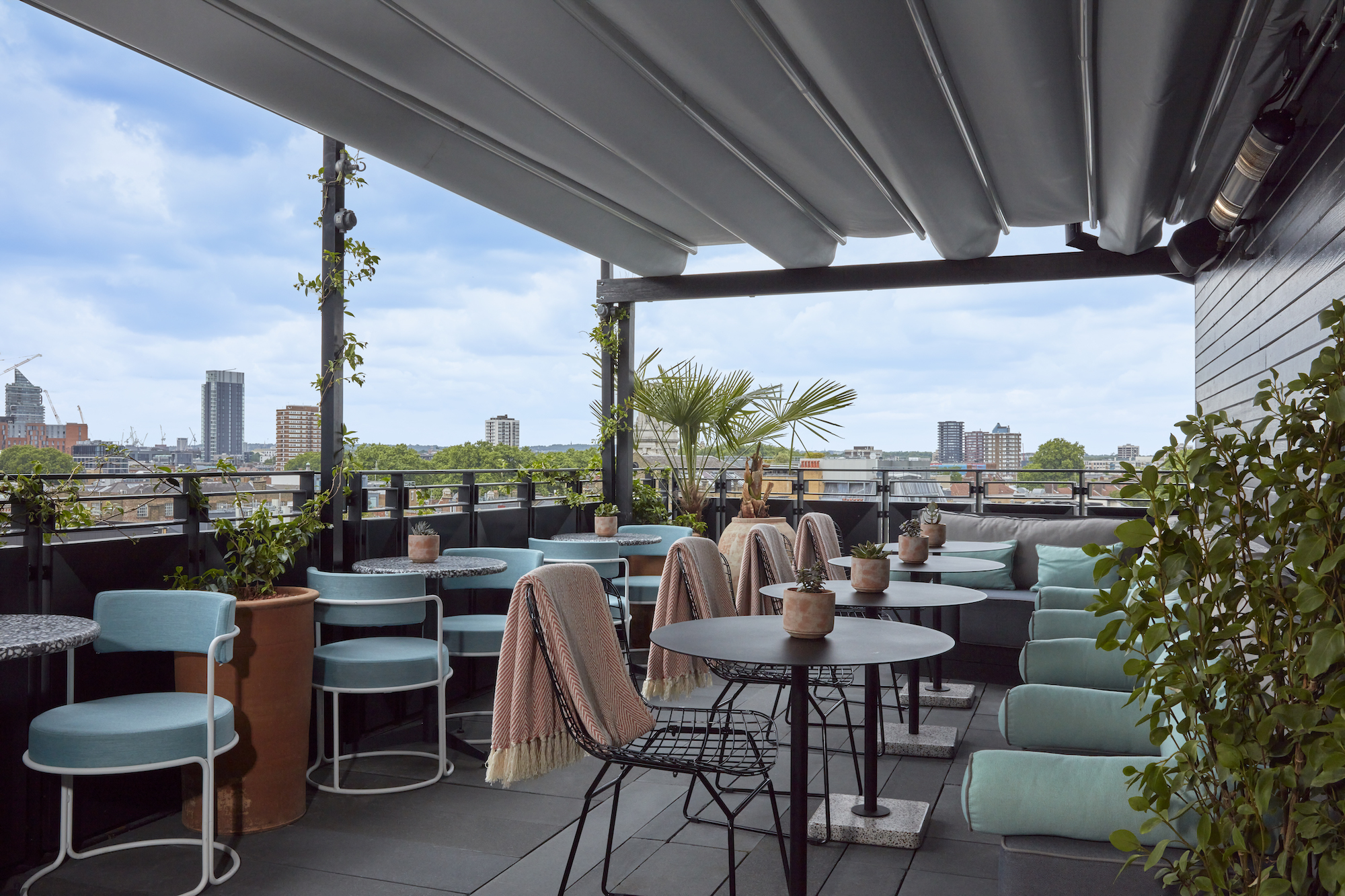 A serene rooftop terrace at the hotel, offering a perfect spot for relaxation and enjoying the surrounding views.