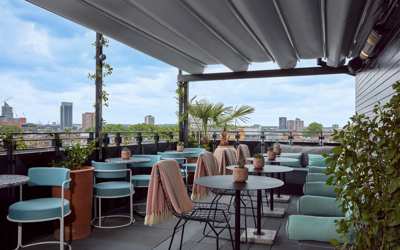 A serene rooftop terrace at the hotel, offering a perfect spot for relaxation and enjoying the surrounding views.